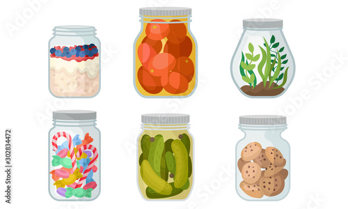 Foto Closed glass jars with different products