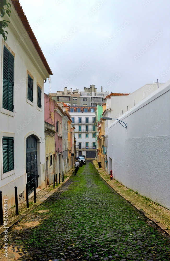 Narrow street in the Lisbon city Portugal 30.Oct.2019 It is famous for its beautiful labyrinthine streets