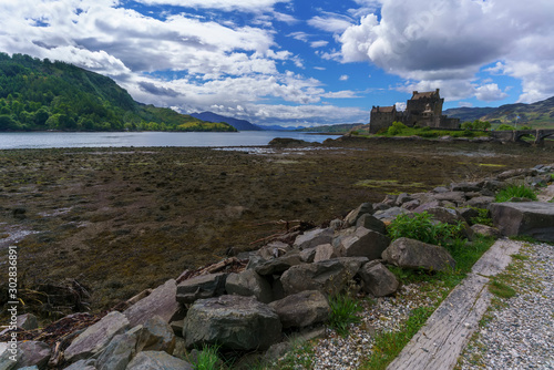 Eilean Donan Castle is one of the most visited and important attractions in the Scottish highlands , at the point where three great sea-lochs meet , Kyle of Lochalsh , Scotland