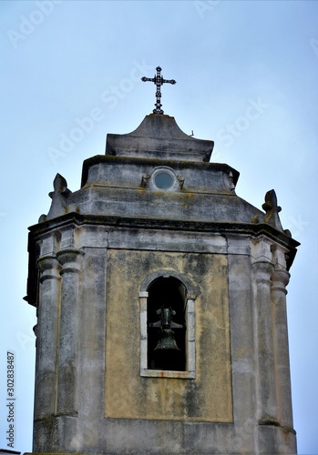 an old church tower with a bell
