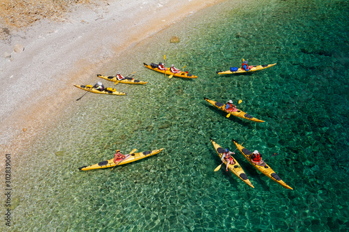 Group of sea kayak on the beach, Adriatic Sea, Croatia photo