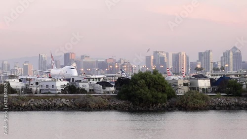 Airbus Boeing in airport skyline at dusk photo