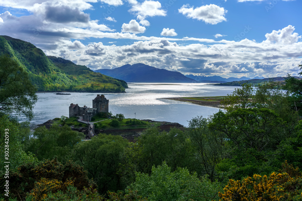 Aerial view of Eilean Donan Castle is one of the most visited and important attractions in the Scottish highlands , at the point where three great sea-lochs meet , Kyle of Lochalsh , Scotland