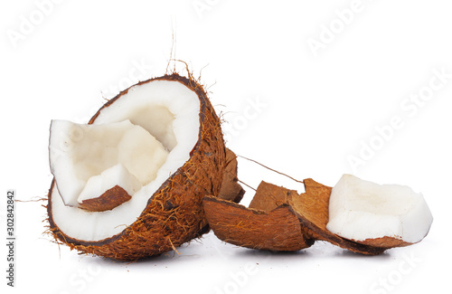 Cracked coconut ready to eat, on white background