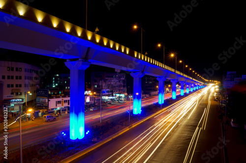 Vector image of colorful light trails with motion blur effect, long time exposure.