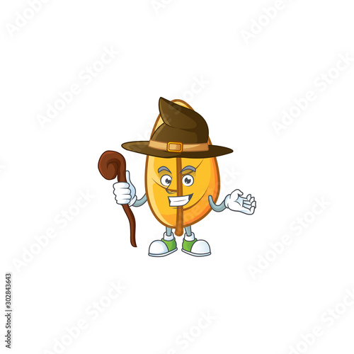 Witch mascot on cartoon yellow autumn leaves