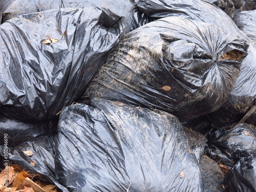 black garbage bags piled up