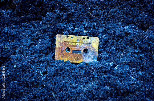Cassette on dirt background