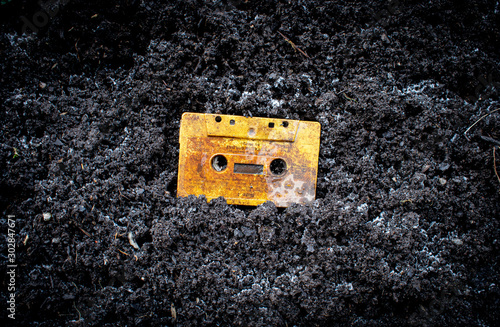 Cassette tape in dirt