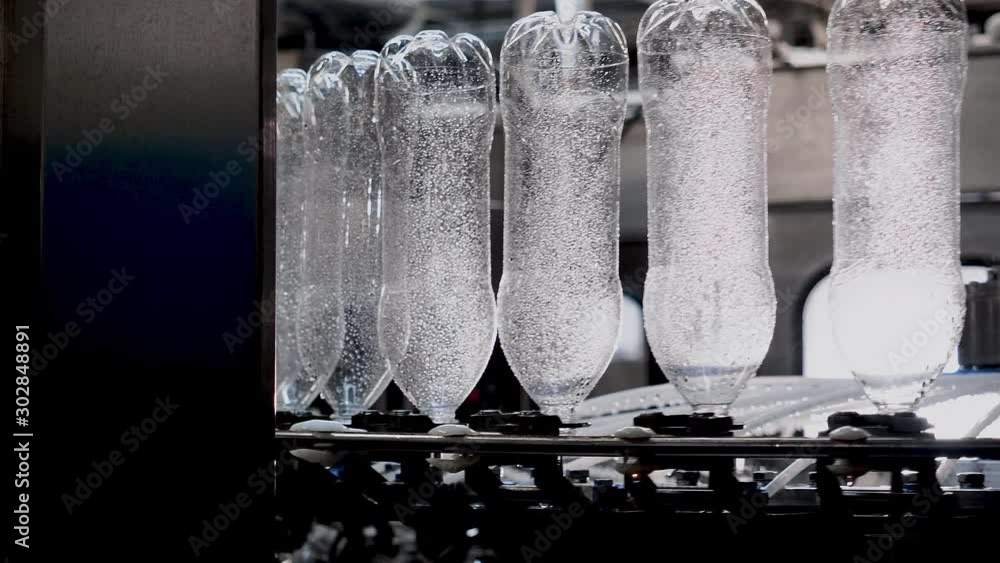 Steam sterilization and thermal processing of plastic containers or