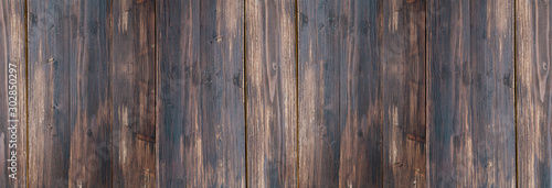 Panoramic dark stripe wooden plank and the empty for copy space wallpaper and background decoration.