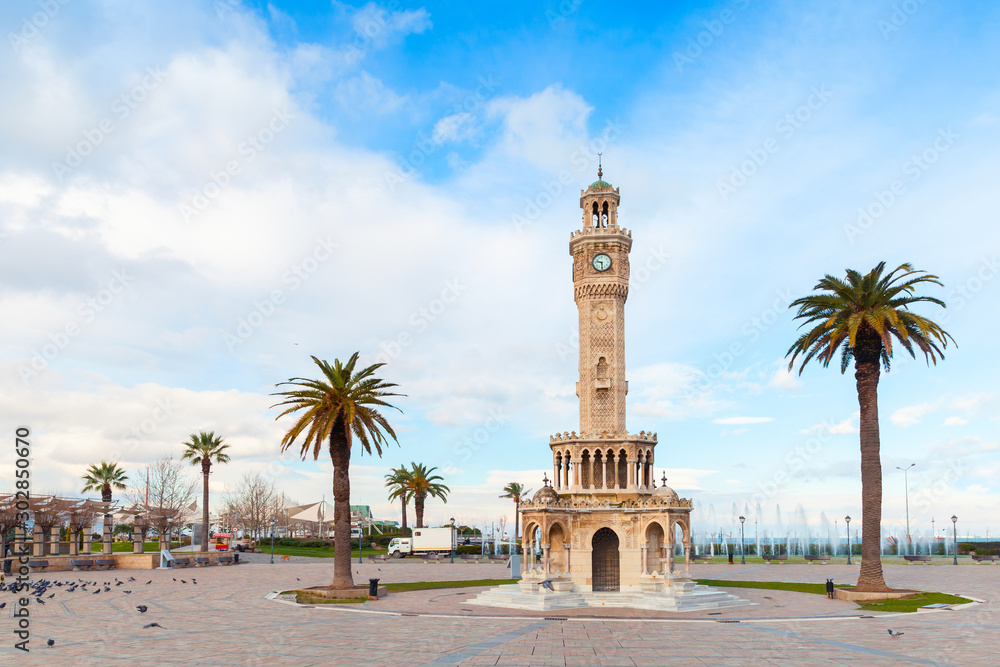 Konak Square view with palm trees and old clock tower - obrazy, fototapety, plakaty 