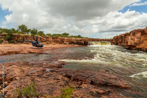 Landscape view of the cascades above the waterfall on the DeLancourte River in the remote Kimberley Region of Western Australia in the Wet Season