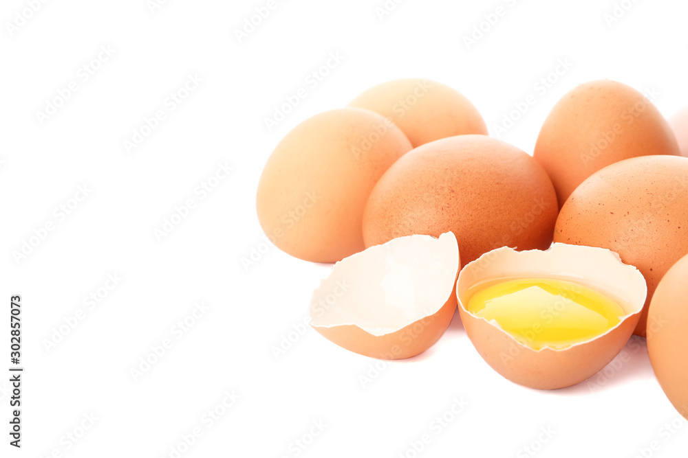 Chicken eggs and half yolk isolated on white background Chicken eggs and half yolk isolated on white background