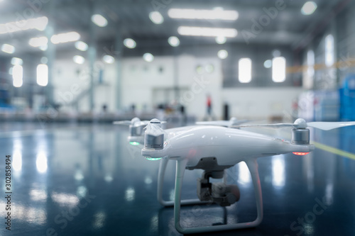 Drone camera surveying over a smart factory using internet of things