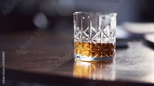 Close up view of glass with alcohol indoors in the restaurant © standret