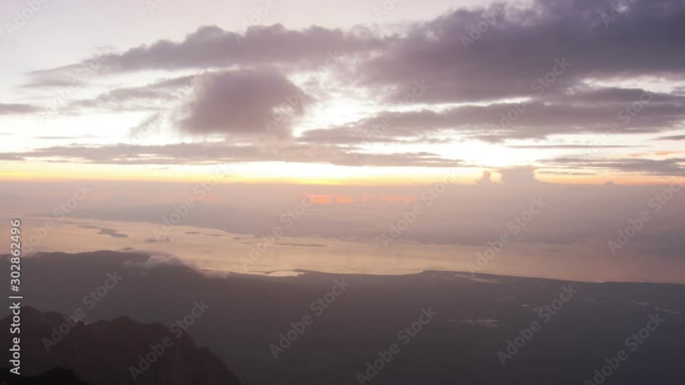 Sunset at Rinjani Volcano Summit, 3726 meters above sea level, Lombok Island, Indonesia Sunset at Rinjani Volcano Summit, 3726 meters above sea level, Lombok Island, Indonesia