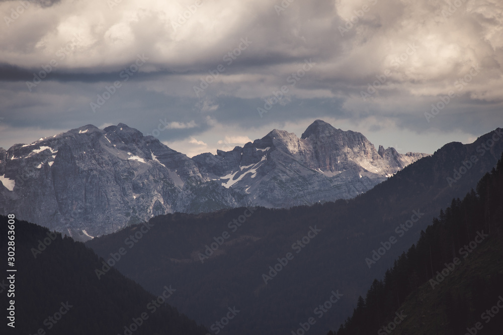 glimpse of the imposing Dolomites of Val di Sole