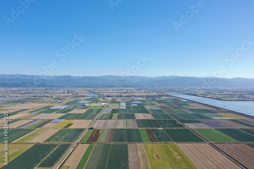 A vast farmland facing the sea