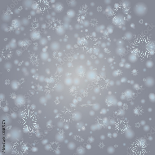 Holiday winter background with flay dynamic blurred snowflakes