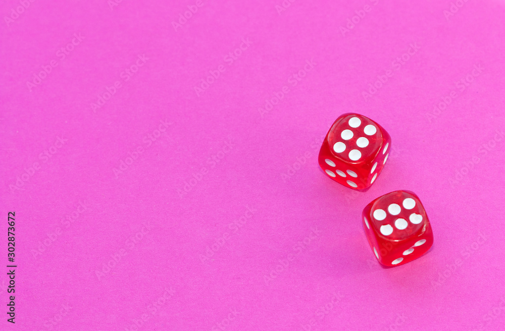 Gambling dices on a pink background. Gambling dices on a pink background.