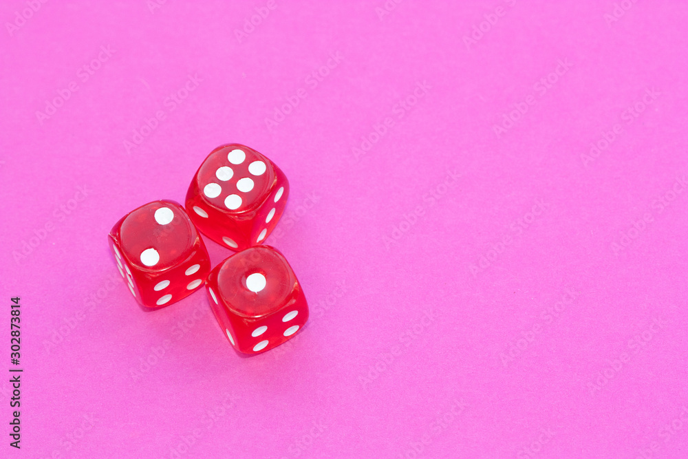 Gambling dices on a pink background. Gambling dices on a pink background.