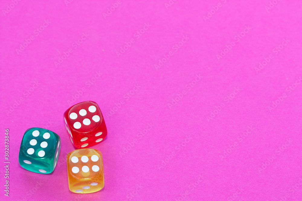 Gambling dices on a pink background. Gambling dices on a pink background.