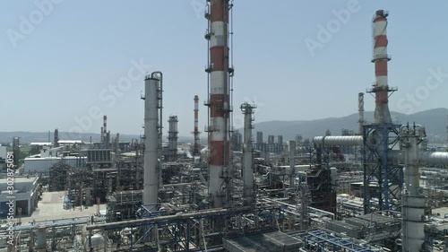 Wallpaper Mural Aerial footage of a large scale Oil refinery with smoke stacks and petroleum storage tanks Torontodigital.ca