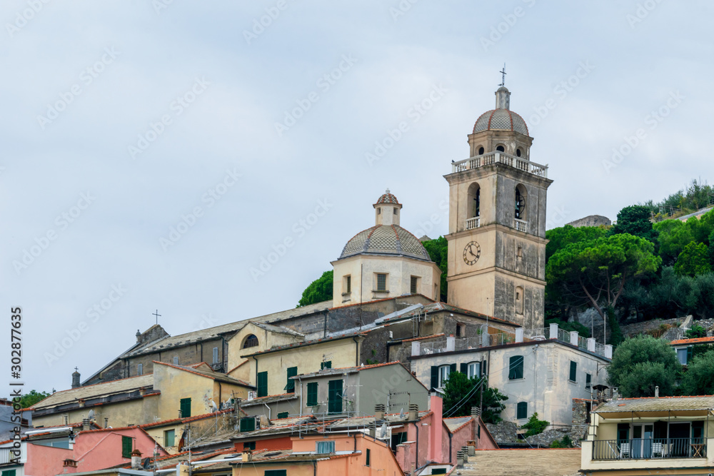 The Church of San Lorenzo and colorful buildings from Porto Venere, La Spezia, Italy