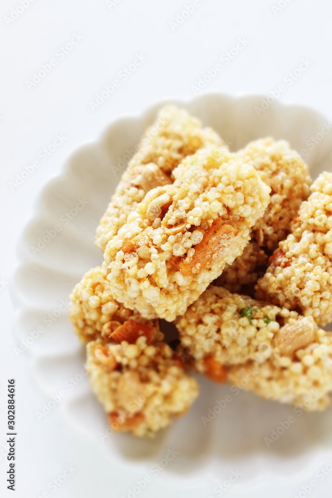 Asian confectionery, rice cracker on dish with copy space Asian confectionery, rice cracker on dish with copy space