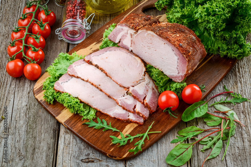 Baked pork in different spices with vegetables Baked pork in different spices with vegetables