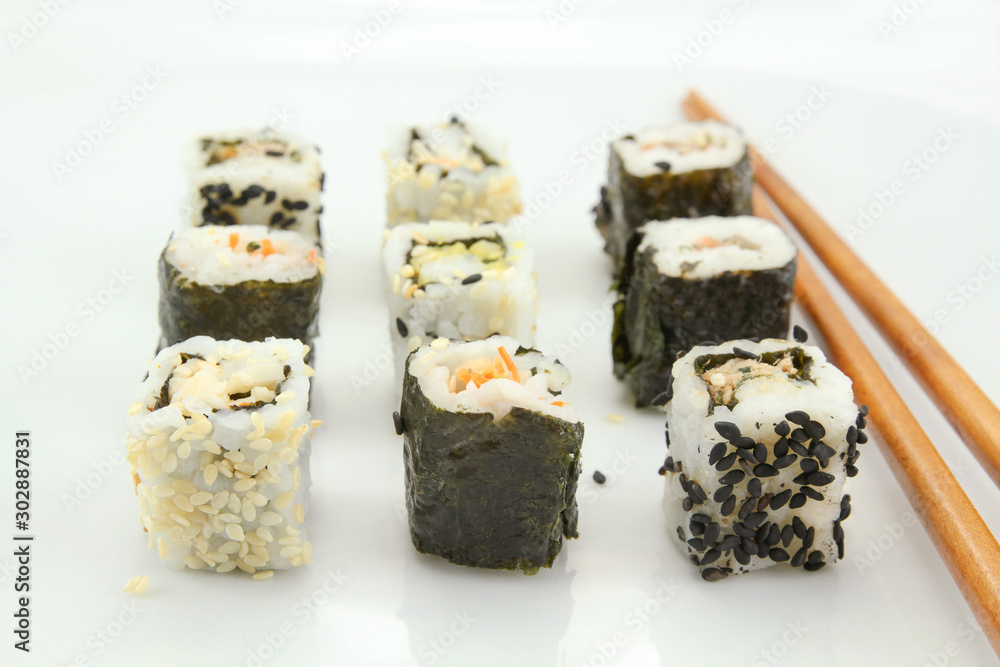 several makis on a white background several makis on a white background