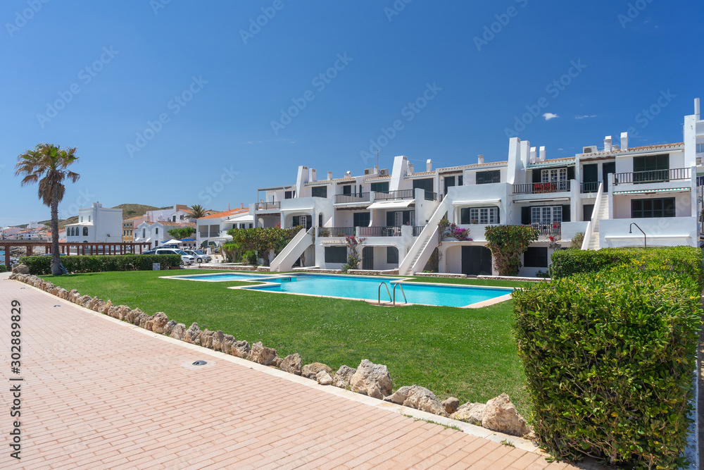 Fototapeta premium View of Traditional Spanish street in city of island Menorca