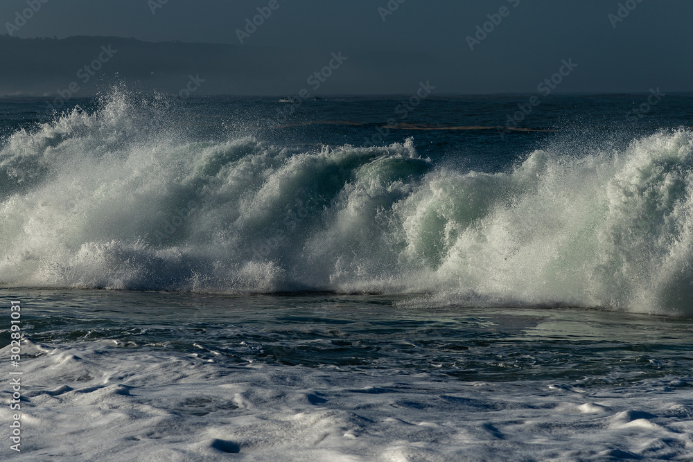 Foamy Atlantic ocean wave at Portugal coast.