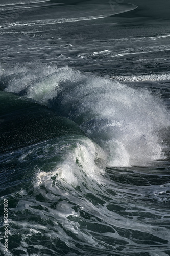 Foamy Atlantic ocean wave at Portugal coast.