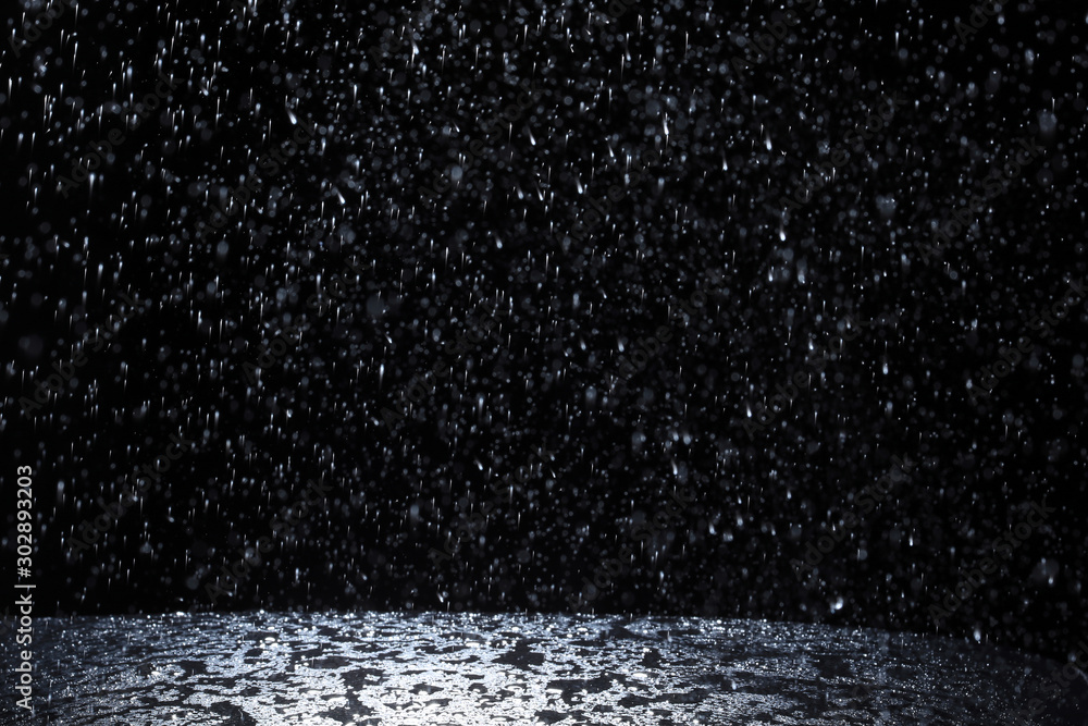 Dark background shot of rain falling - obrazy, fototapety, plakaty 