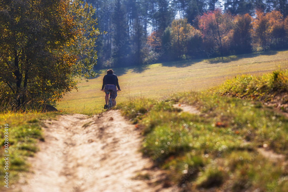 Cyclist ride on the bike path, Autumn bike ride