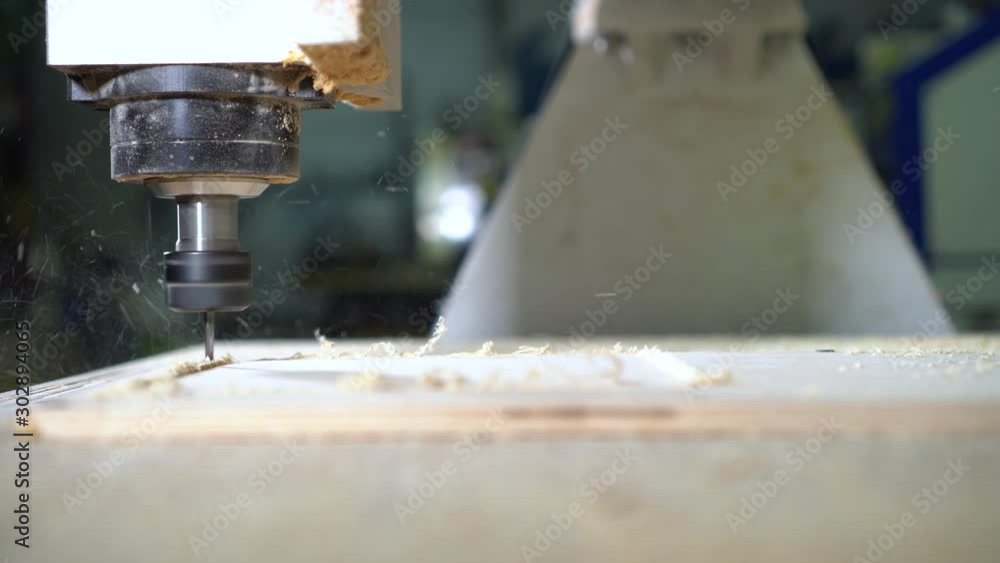 Cnc wood milling machine in work Cnc wood milling machine in work