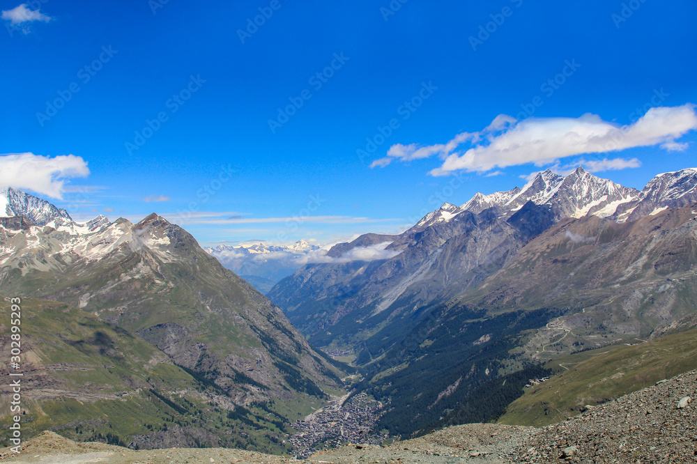 Colorful mountain landscape of the Swiss Alps on a summer day