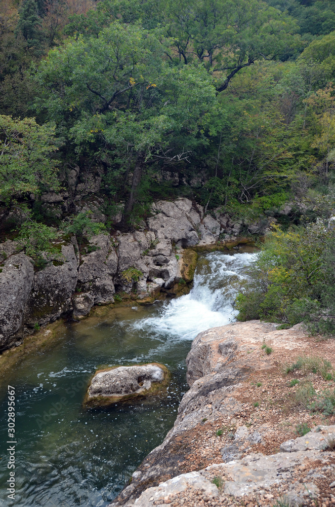 Water flow of the Canyon. Forest and mountain landscapes. Crimea,Russia Water flow of the Canyon. Forest and mountain landscapes. Crimea,Russia