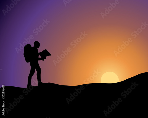 Backpacker silhouette with map in hands - in the sunset/ sunrise light
