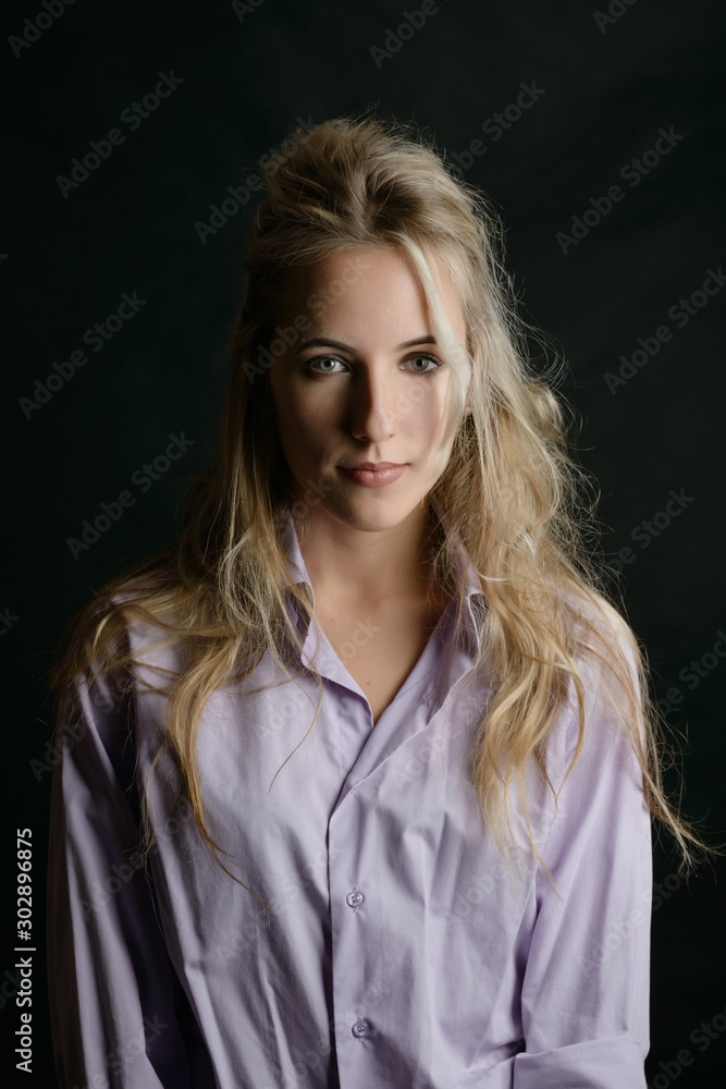 Portrait of beautiful sensual woman with green eyes. Studio shot. Portrait of beautiful sensual woman with green eyes. Studio shot.