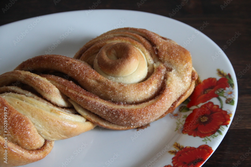cinnamon roll on a plate cinnamon roll on a plate