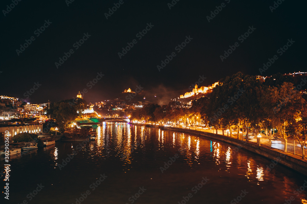 13.07.2018 Tbilisi, Georgia: view of the cultural Georgian night city of Tbilisi with its central square, tourists and night lights