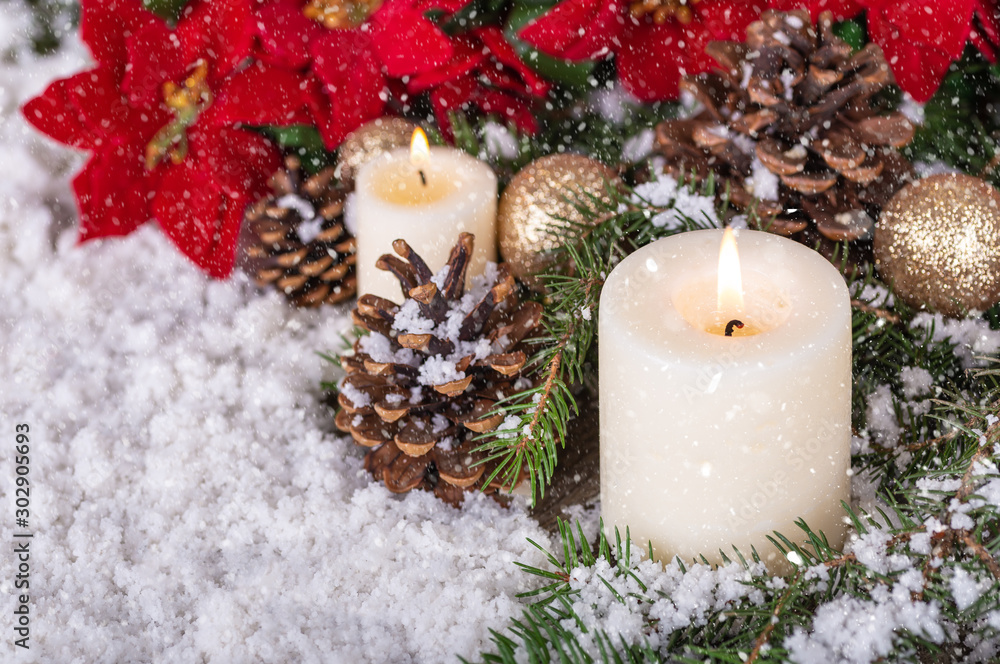 Snowy Scene With Candles and Holiday Decor