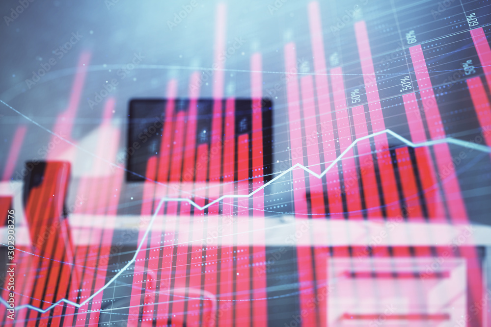 Stock market chart and desktop office computer background. Multi exposure. Concept of financial analysis. Stock market chart and desktop office computer background. Multi exposure. Concept of financial analysis.