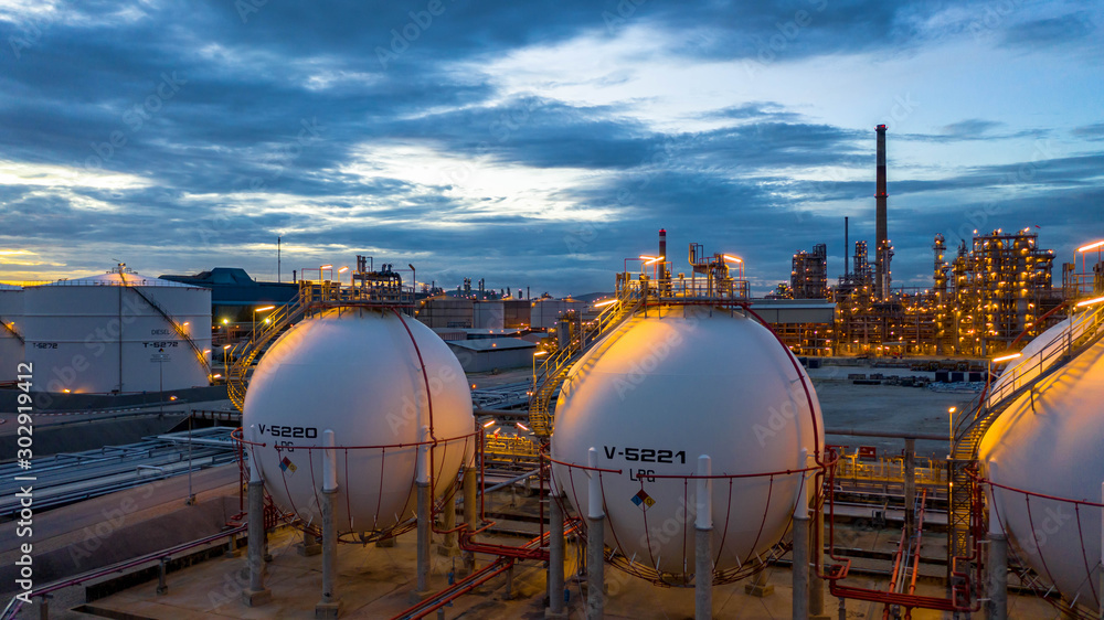 Aerial view oil storage tank terminal and tanker, petrol industrial . Aerial view oil storage tank terminal and tanker, petrol industrial .