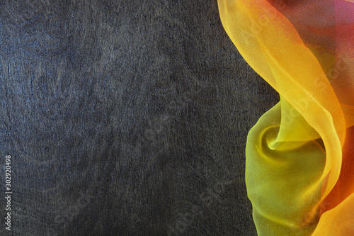 Silk colored fabric on dark...