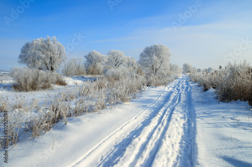 Winter road along the river