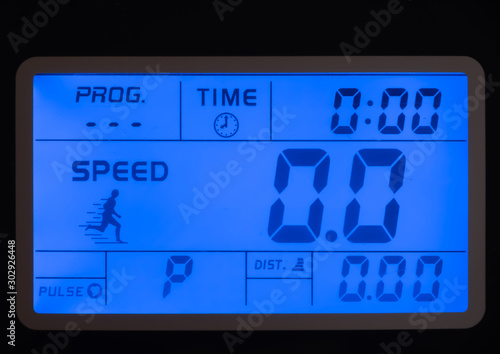 Simple blue treadmill digital panel showing modes, speed, distance and calories etc.